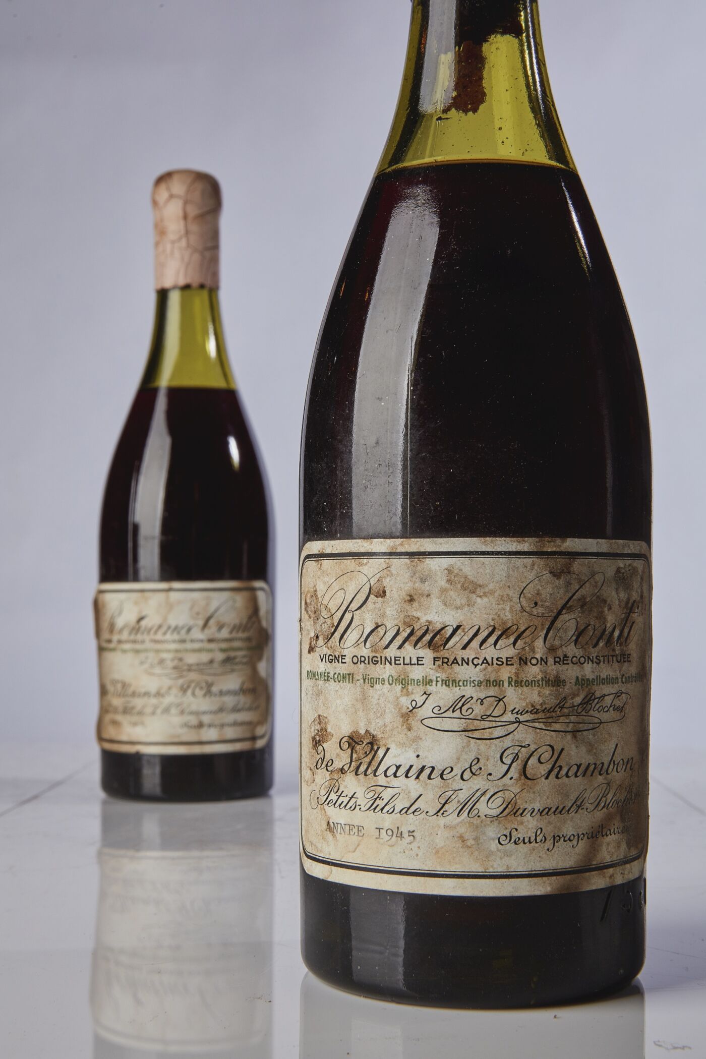 Вина самого. Вино Romanee-Conti 1945 года. Вино Romanee-Conti Grand Cru 1945. Romanee-Conti Grand Cru — $551 314. Romanee Conti вино.